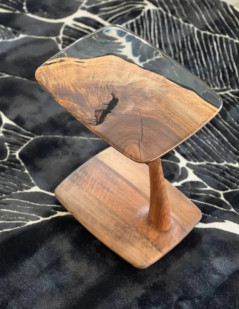 Aurelia luxury resin table surfaces showcase hand-polished solid walnut wood grain protected by clear low-curing epoxy resin