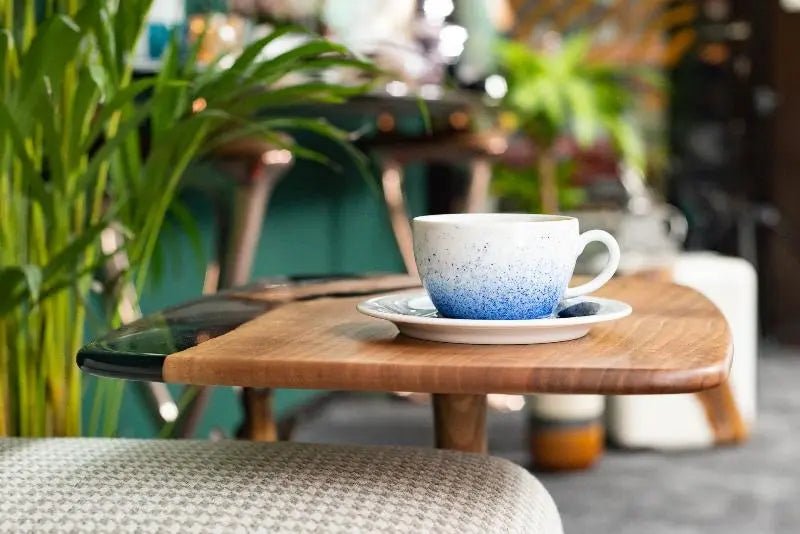 A handcrafted luxury resin table creates an elegant surface for morning espresso and private lounge tea at Home Man Cave