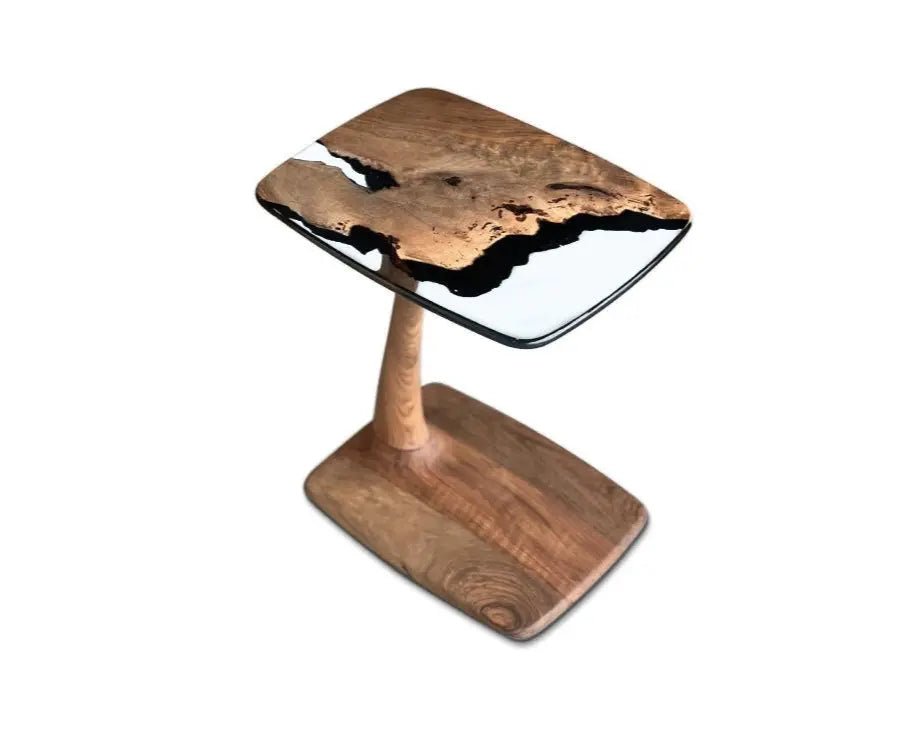 Aurelia luxury resin table design combines organic aged walnut wood with hand-polished clear epoxy for luxury interior spaces