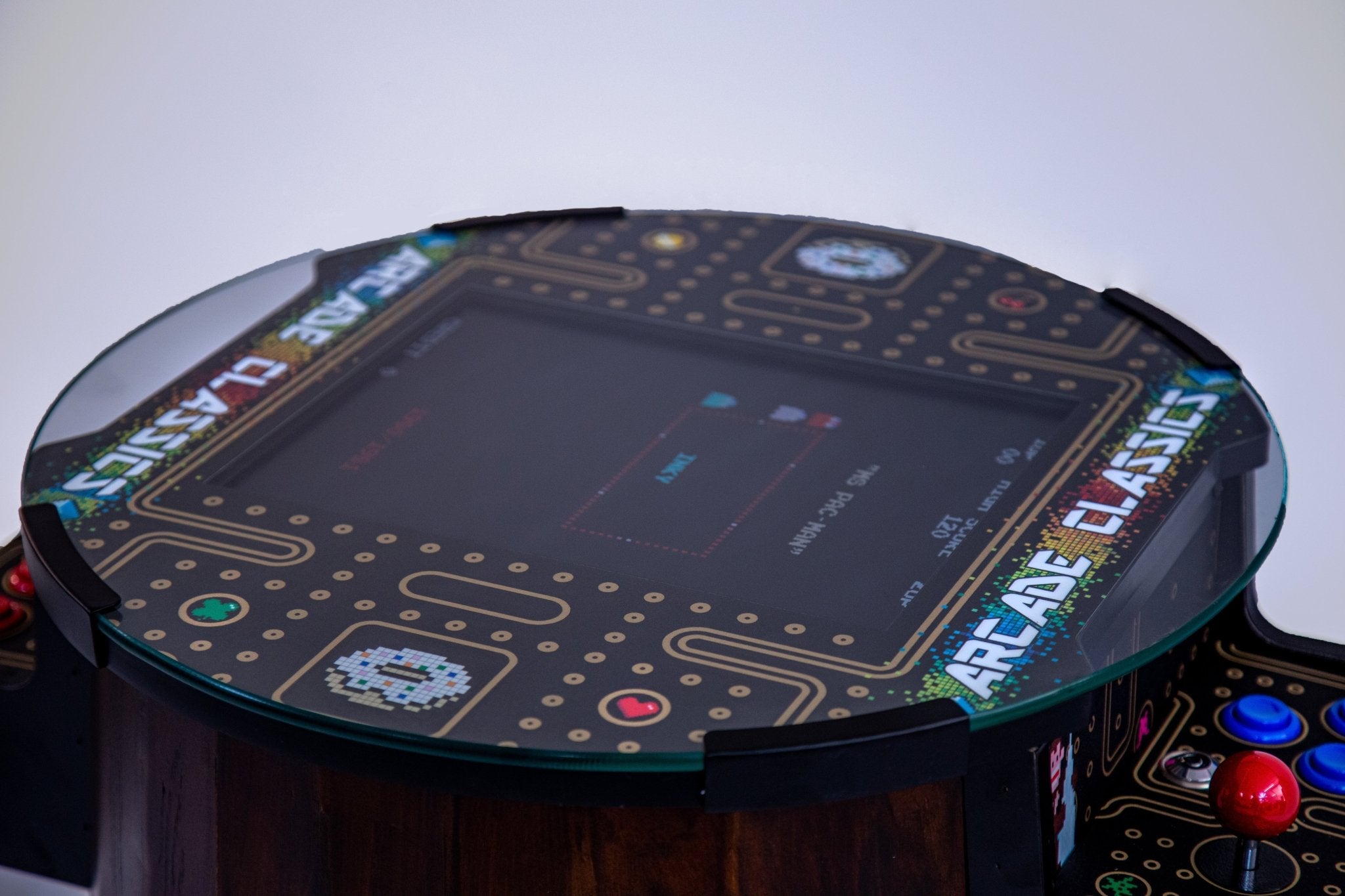 Premium barrel arcade machine features a bespoke tempered glass tabletop shielding a high-definition commercial display.
