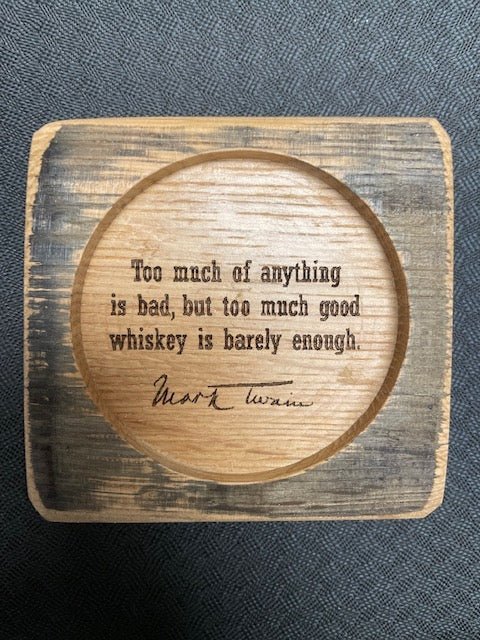 Artisan whiskey quote coasters rendered with laser-engraved Mark Twain quotes on precision-milled white oak stave wells.