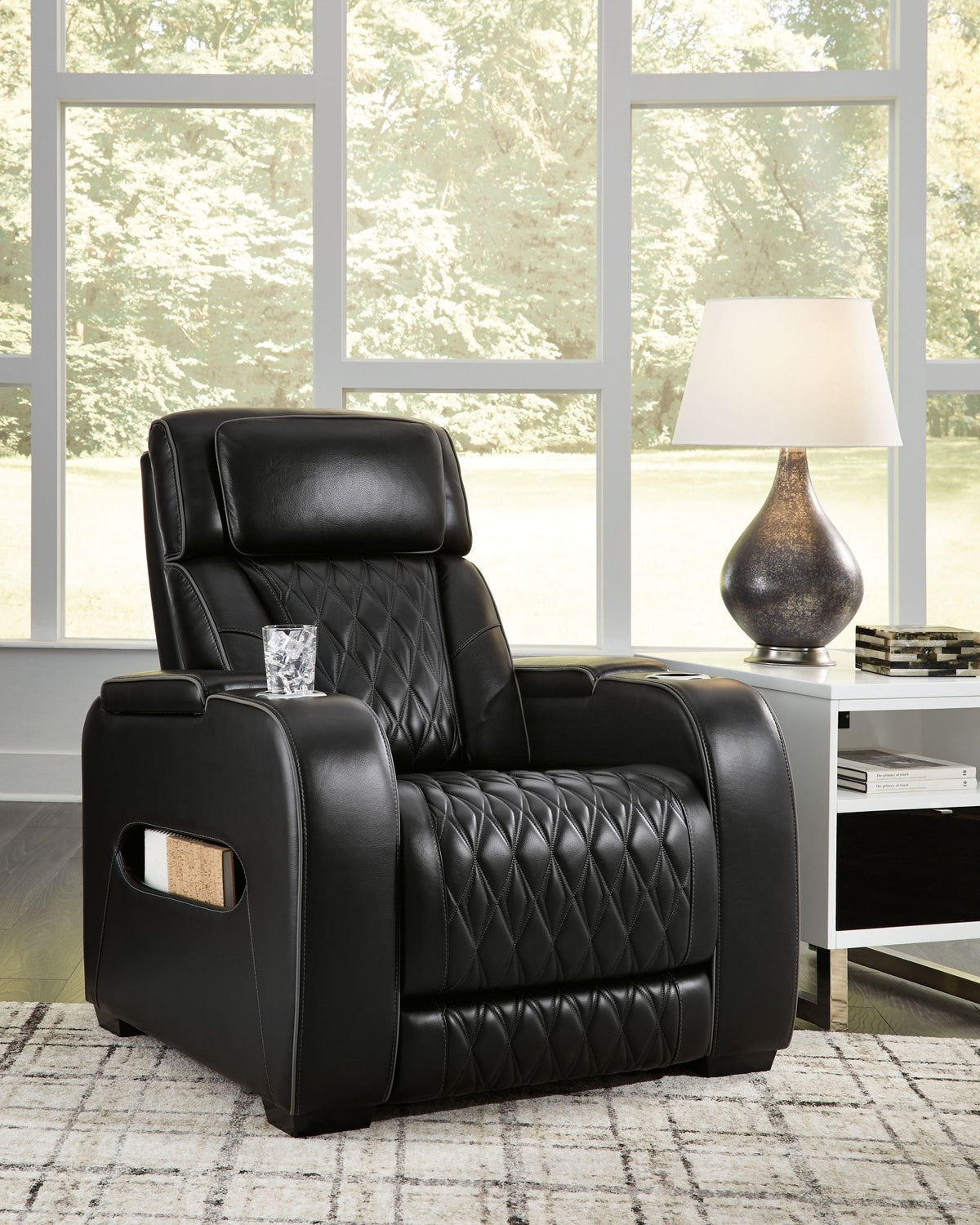 Boyington luxury power recliner defines understated executive luxury within an artisan private club salon at Home Man Cave