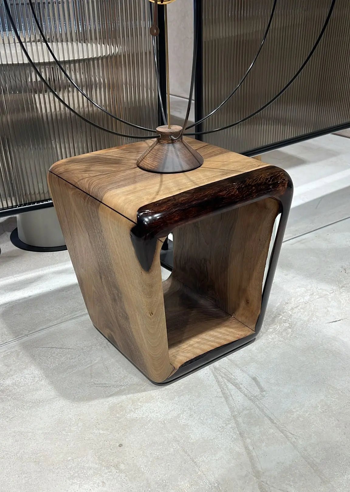 Solid hardwood resin side table engineered with hand-cast optical clarity and certified commercial residential durability.