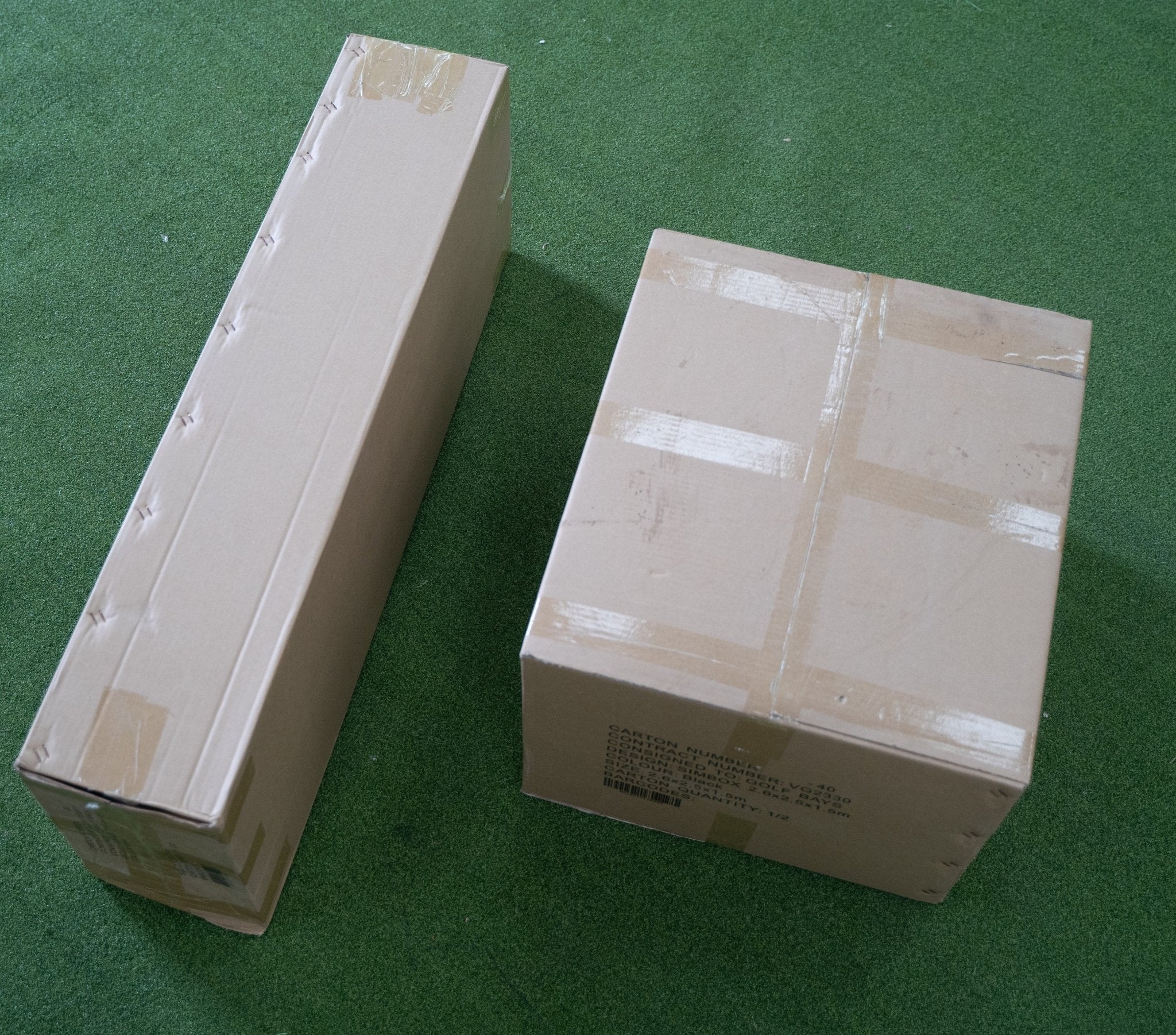 SimBox golf simulator enclosure packaged for shipping – protective packaging for safe delivery