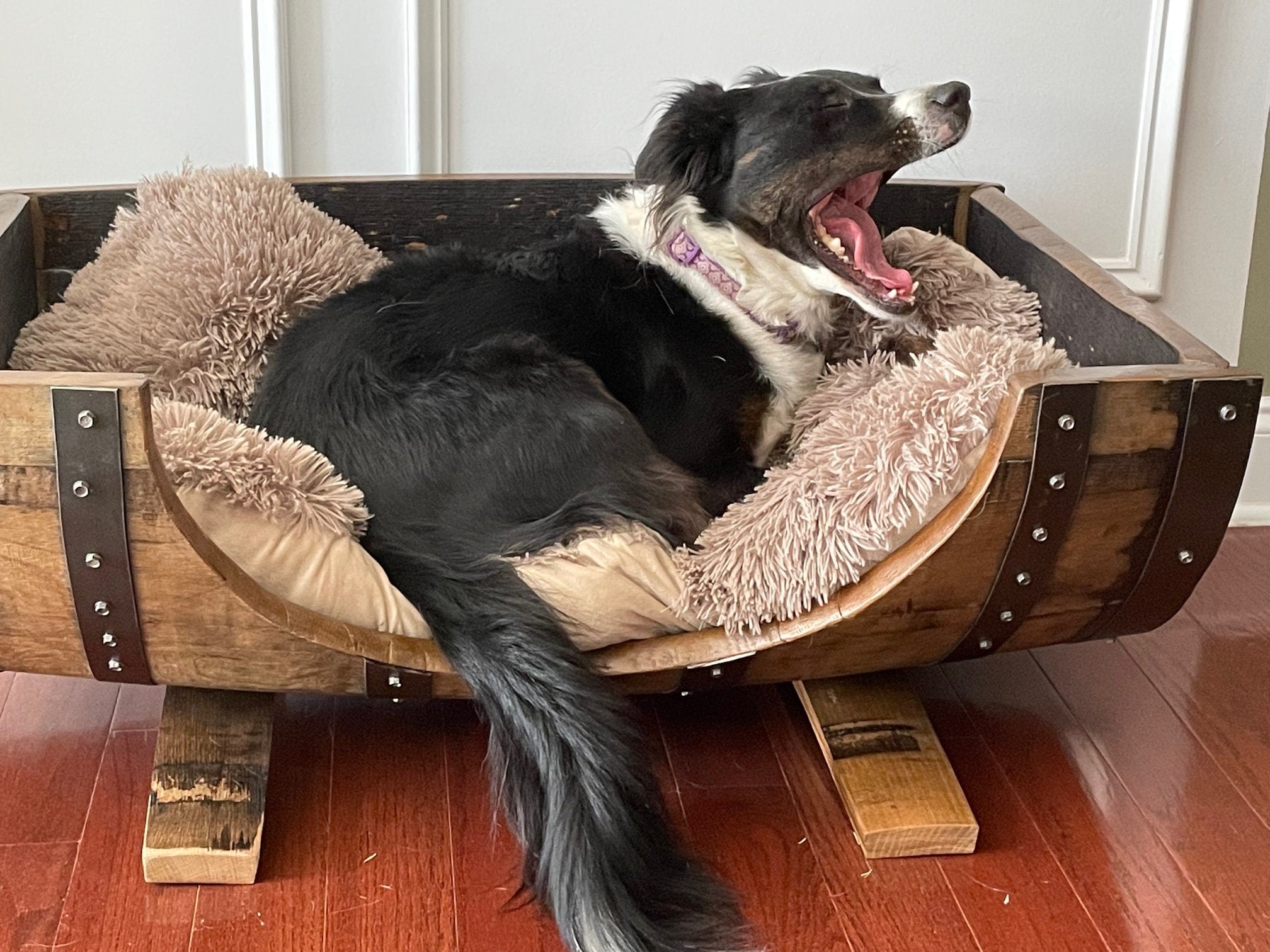 Bespoke reclaimed dog bed fashioned from aged distillery casks to elevate luxury residential interiors at Home Man Cave.