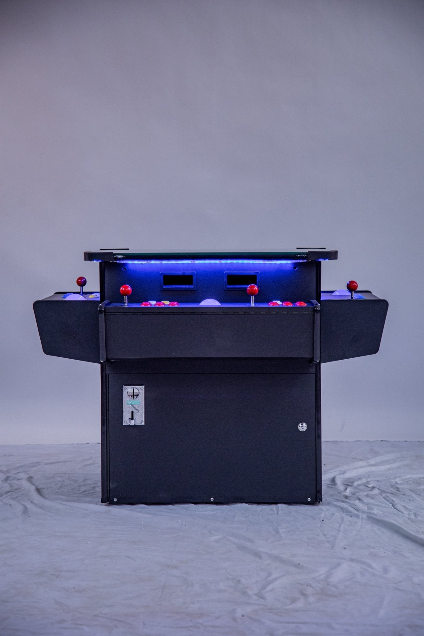 Premium cocktail arcade console utilizes a fluid vintage analog trackball interface paired with responsive SANWA joysticks.
