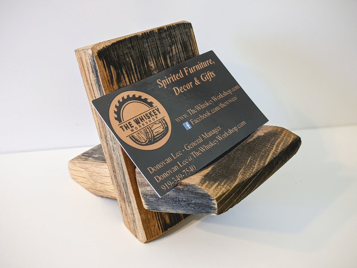 Bespoke whiskey barrel cutoffs repurposed into an artisan desktop business card holder with authentic charred oak staves.
