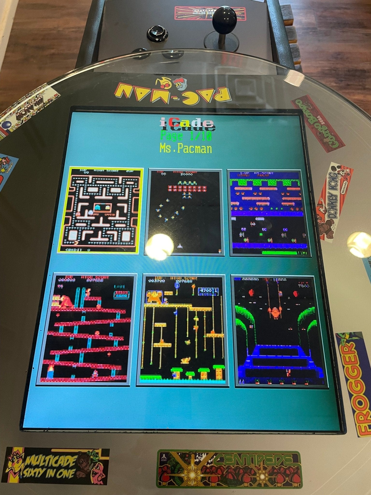 custom barrel arcade table illuminated retro cocktail multi game screen display upscale media centerpiece at Home Man Cave