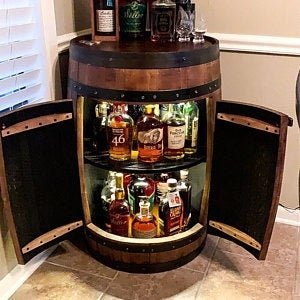 Authentic bourbon barrel cabinet hand-crafted from reclaimed whiskey casks for private estate bar rooms at Home Man Cave.
