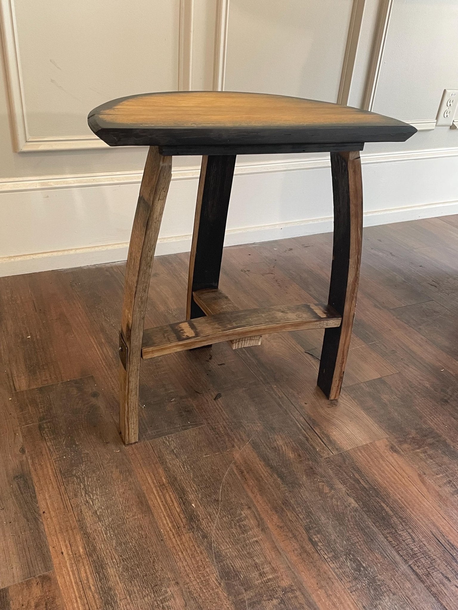 Bespoke bourbon bar stool constructed with genuine steel barrel hoop structural leg bracing and a 300 lb weight capacity