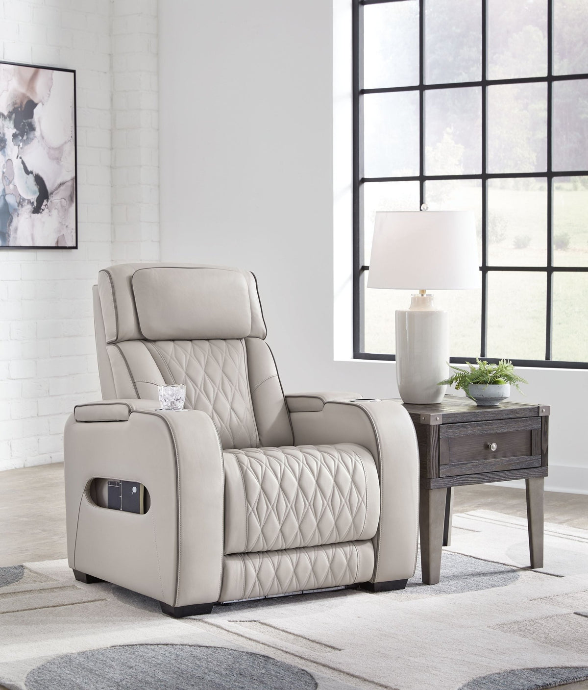 Boyington luxury power recliner illuminates bespoke geometric quilting with architectural blue LED accents at Home Man Cave