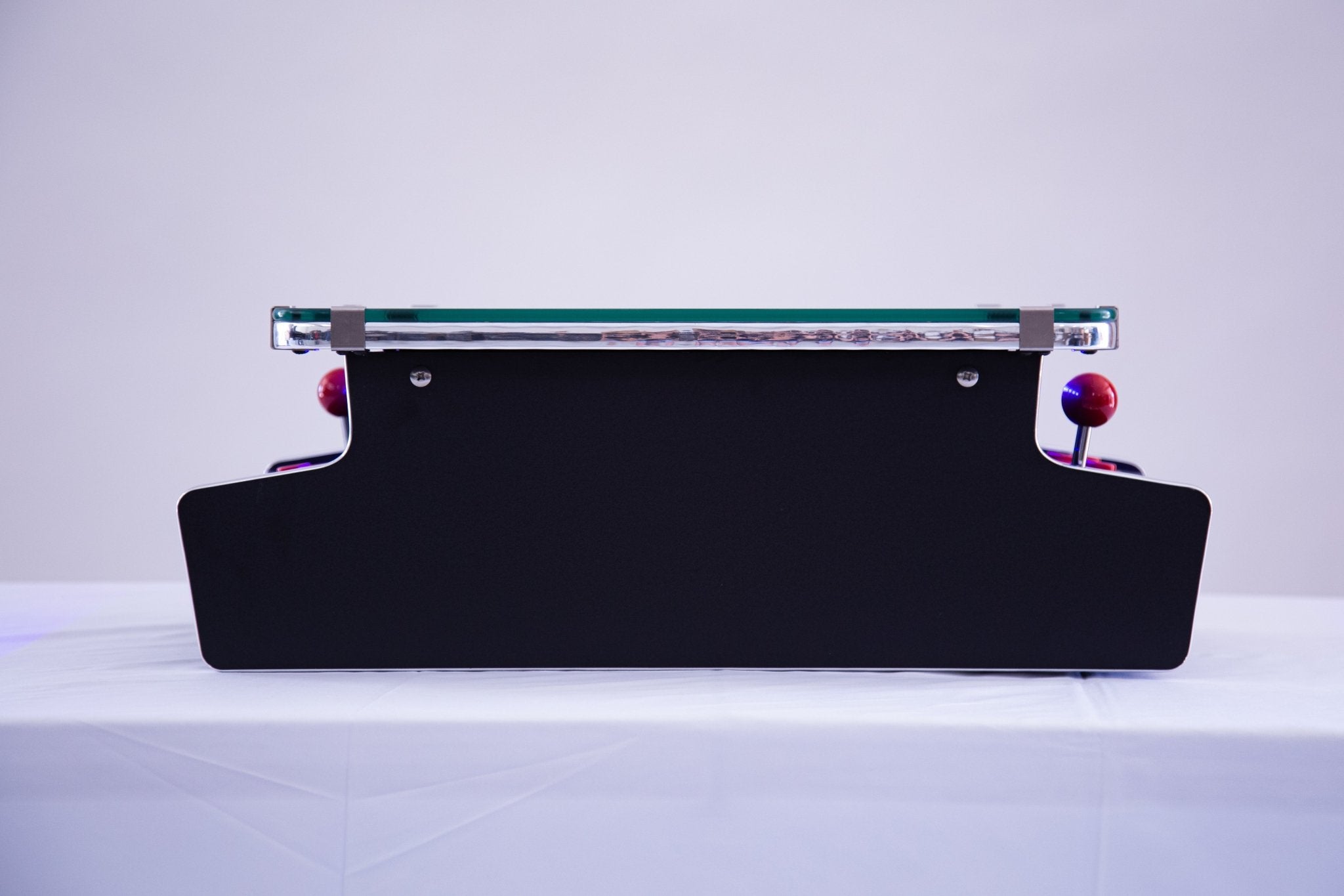 Elite tabletop arcade console showcases a streamlined low-profile chassis backing engineered for luxury kitchen island bars