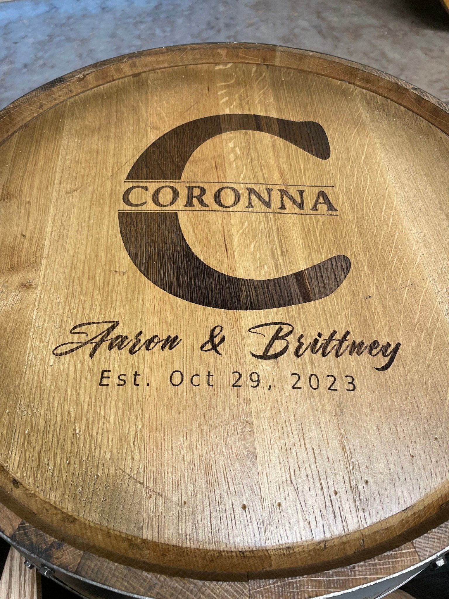 Custom barrel table showcasing custom monogram laser engraving on a hand-sanded rustic white oak barrel top surface