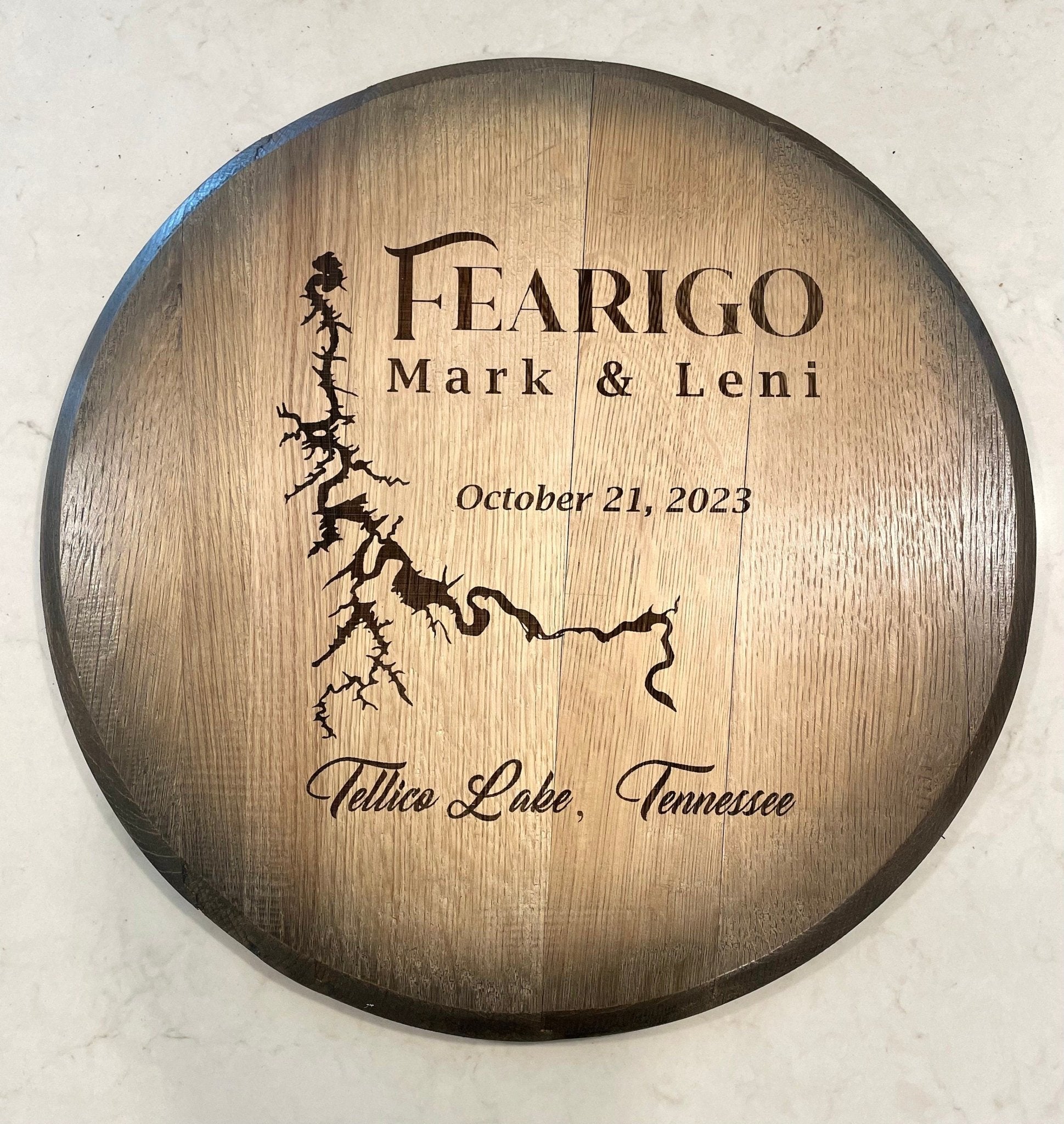 Custom barrel table highlighting bespoke laser-etched family name custom insignia on solid American white oak cooperage