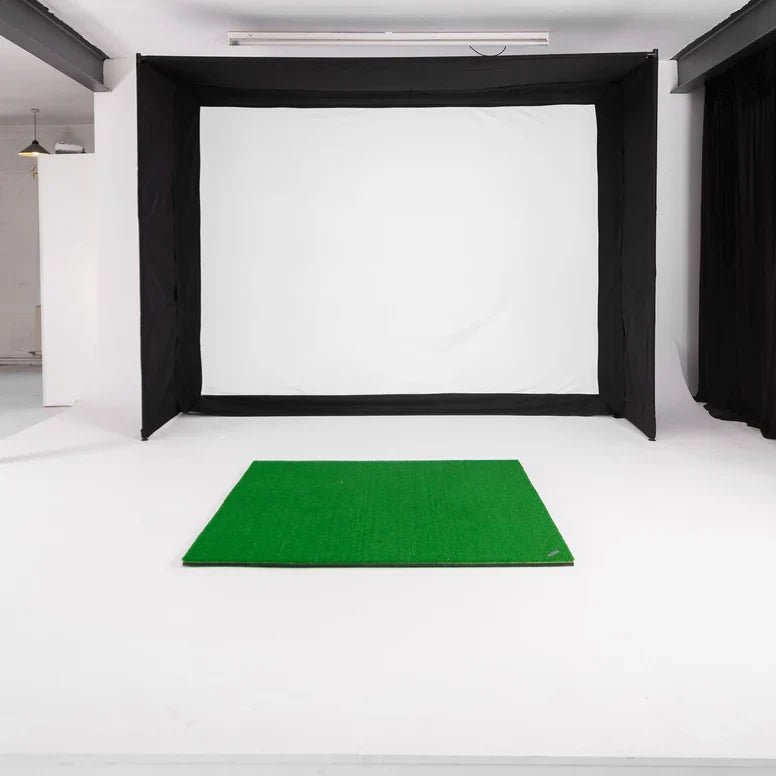 GolfBays EasySim golf simulator enclosure with matte black light-absorbing fabric inside an estate suite at Home Man Cave