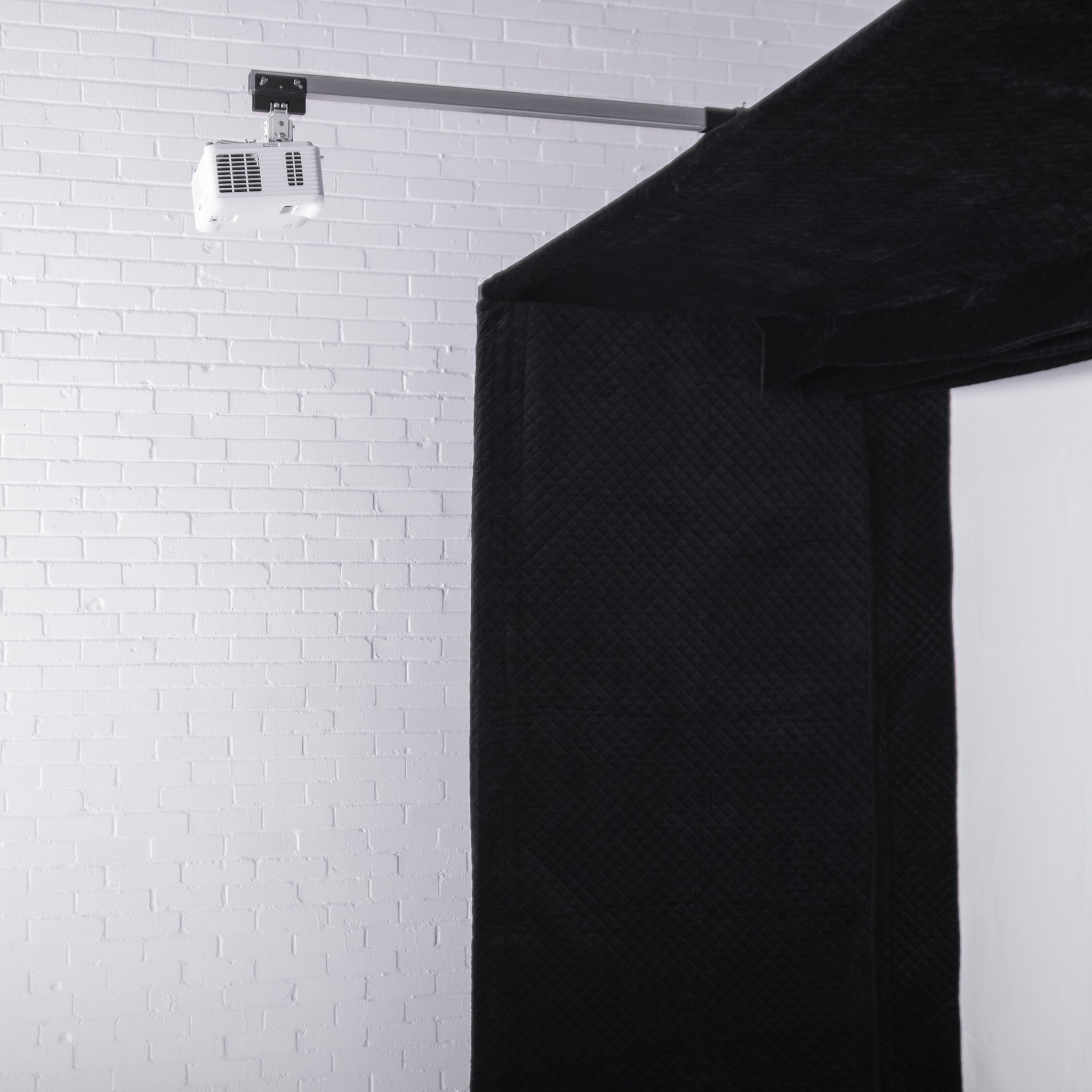 GolfBays Lux golf simulator enclosure – corner frame detail showing premium build quality