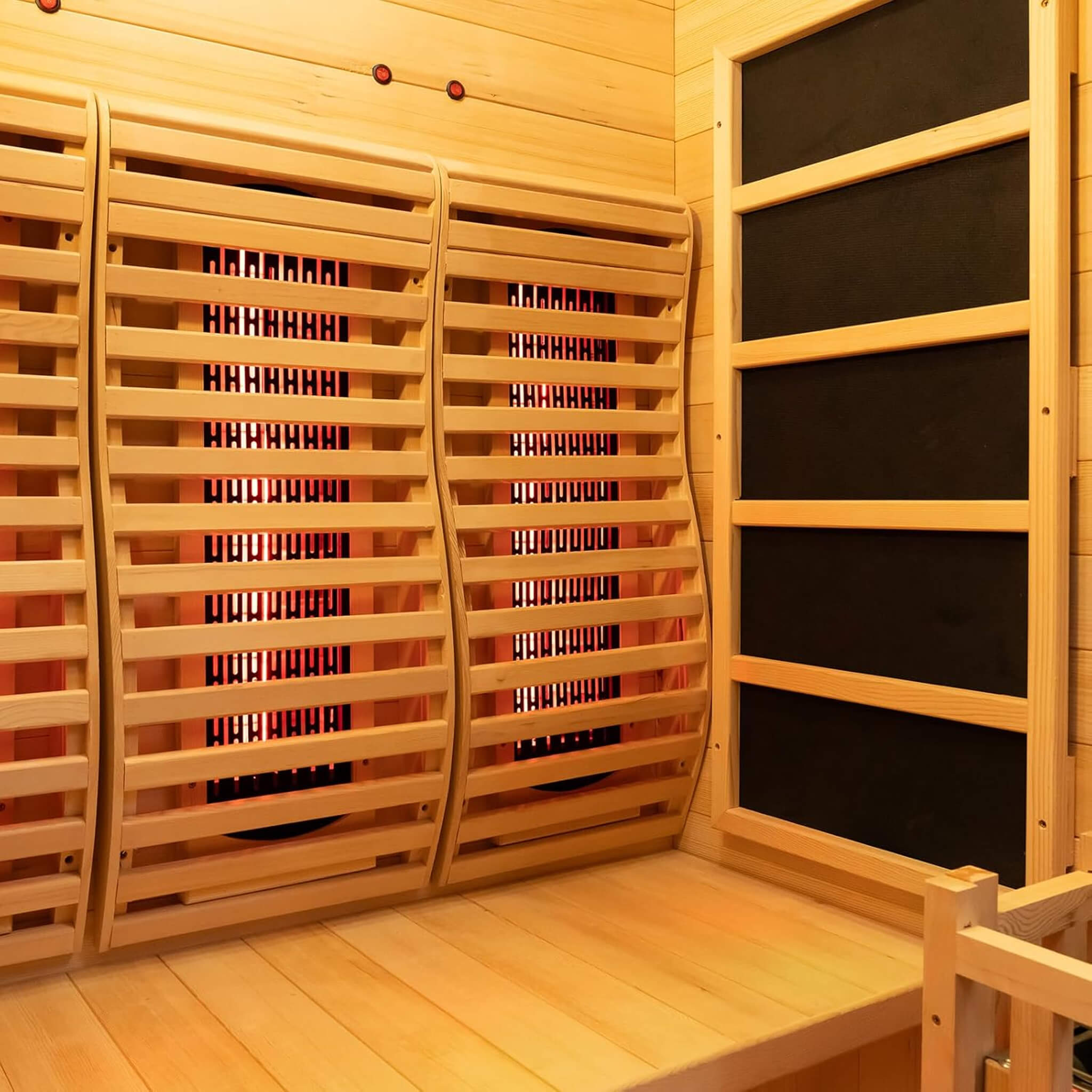 luxury 2-person indoor hybrid sauna interior timber seating slatted hemlock backrest far infrared heat panel placement cabin