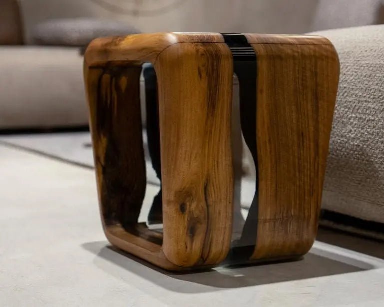 Artisan resin side table showcasing organic wood grain pathways encased in optical-grade clear resin for bespoke spaces.