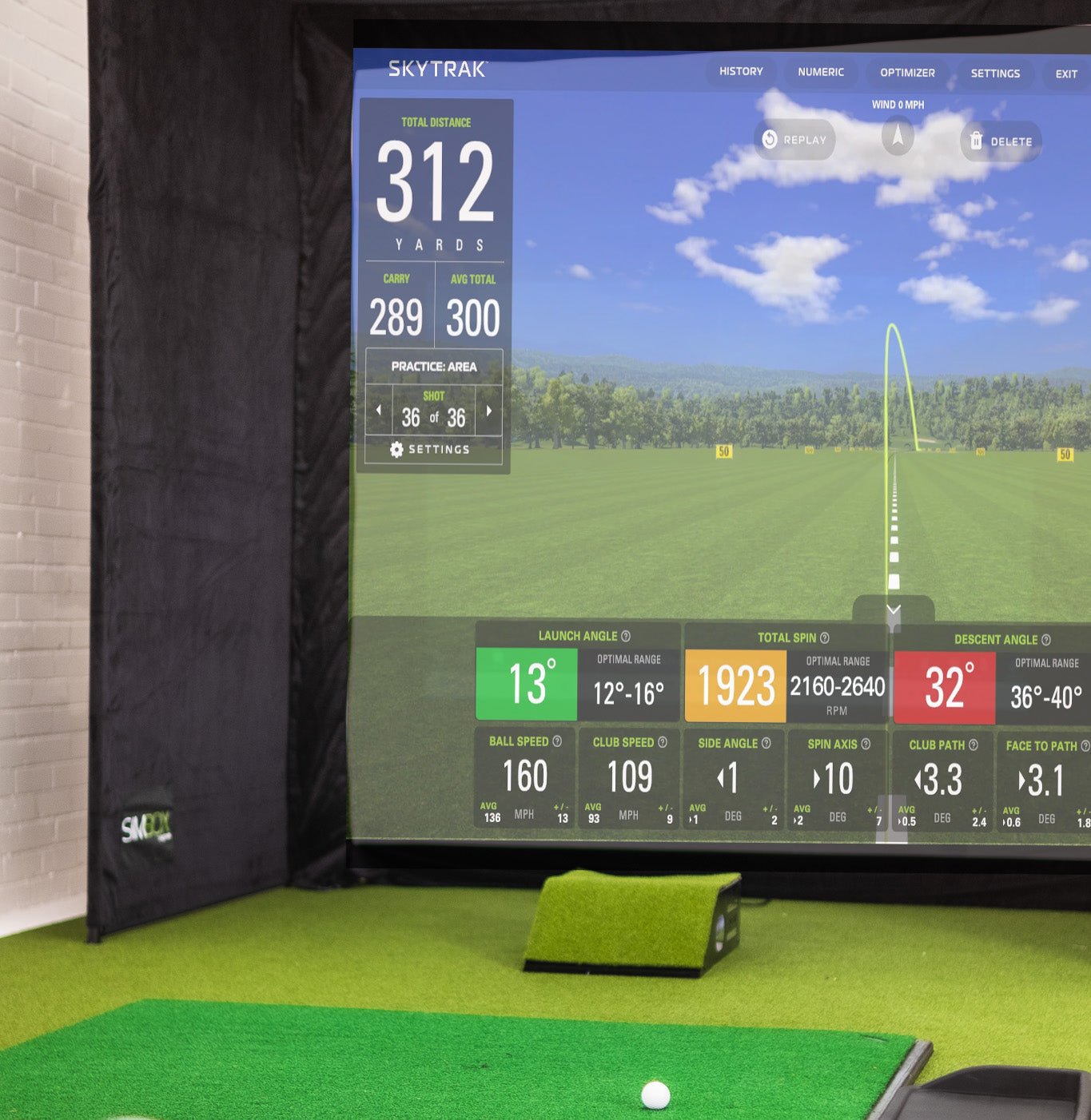SimBox golf simulator impact screen displaying golf course – pro projection screen close-up