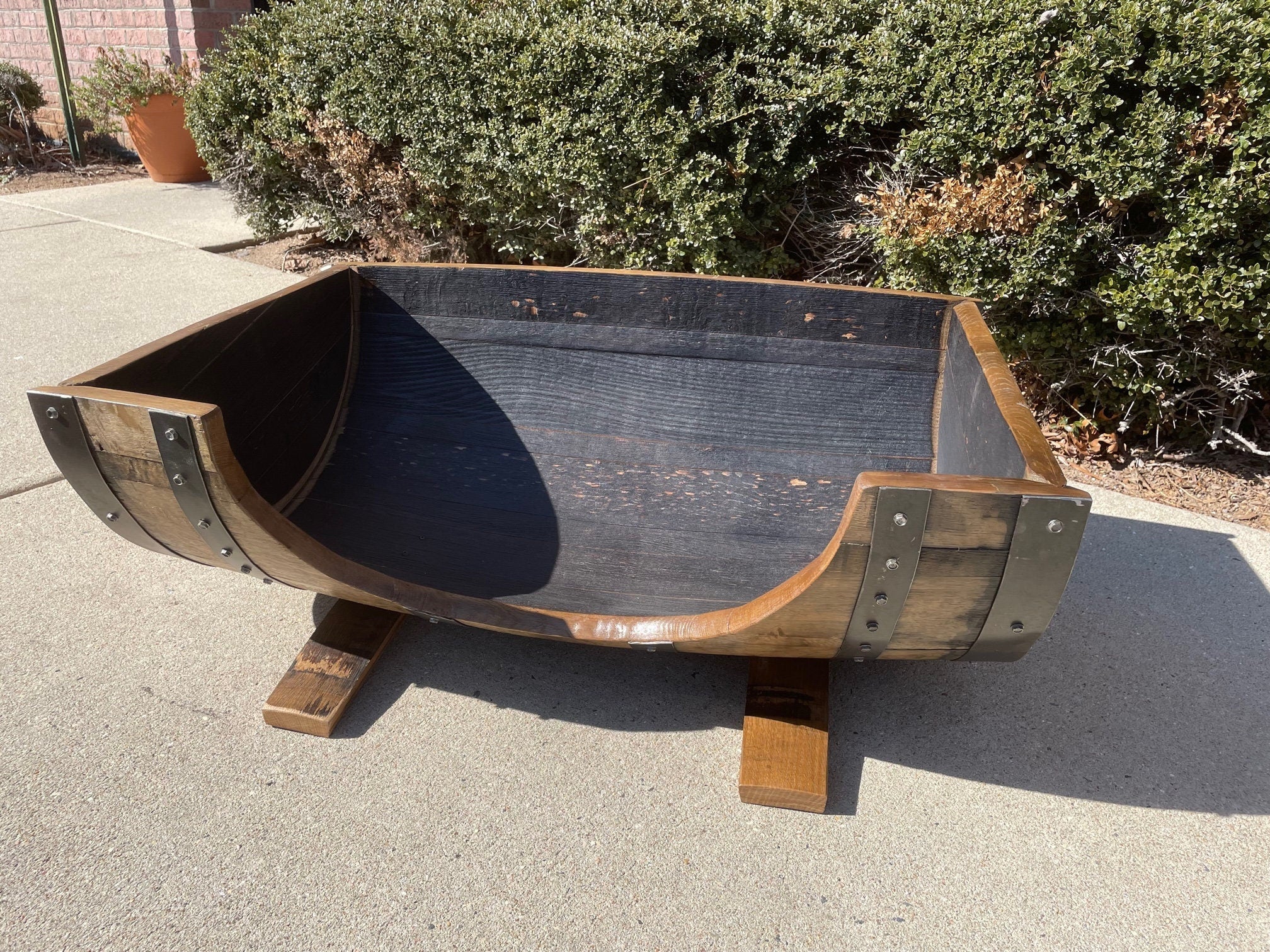 Bespoke reclaimed dog bed engineered with reinforced steel barrel hoops and multi-coat clear protective topcoat finishes.