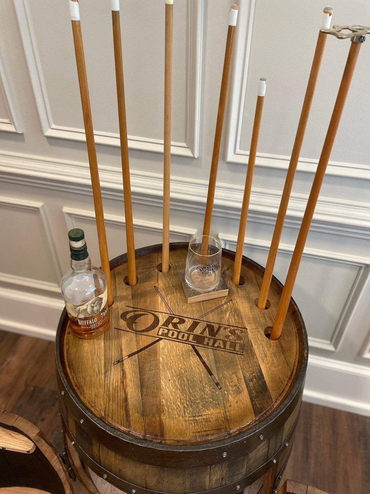 Bespoke whiskey billiards cue cabinet crafted with authentic solid white oak stave timber and dedicated beverage surface.