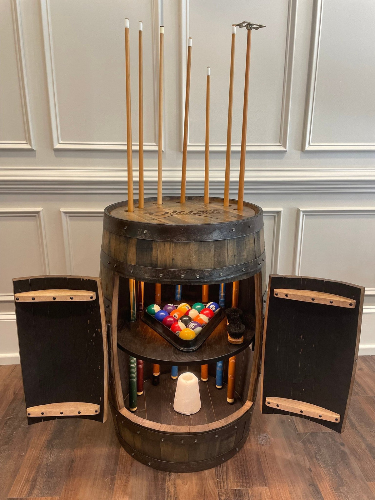 Authentic whiskey billiards cue cabinet hand-crafted from solid oak barrels for executive estate game rooms at Home Man Cave.
